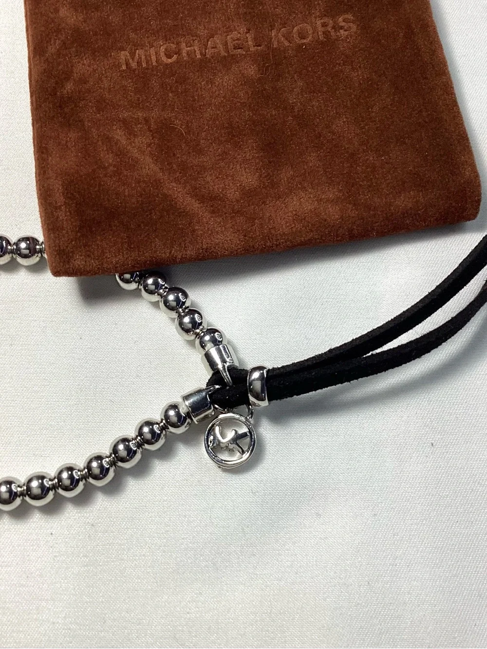 Michael Kors Silver-Tone Beaded Stretch Black Cord Bracelet NWT includes MK Bag
